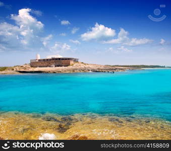 Rocky shore of formentera turquoise sea in Illetes