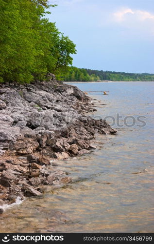 rocky shore of the river in summer