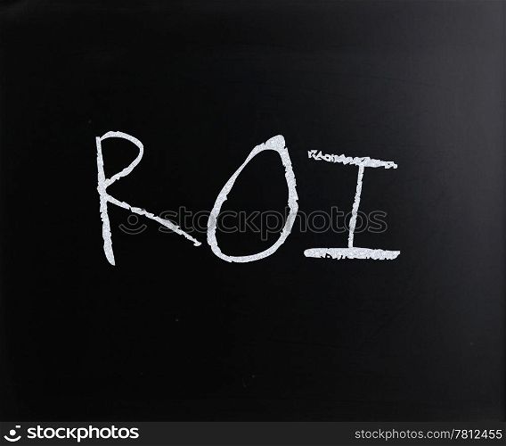 ""ROI" handwritten with white chalk on a blackboard."