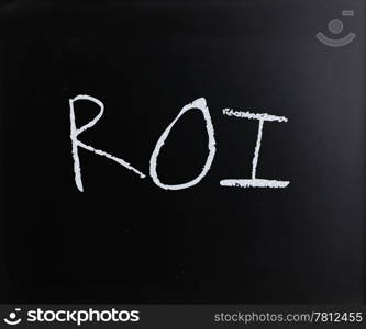 ""ROI" handwritten with white chalk on a blackboard."