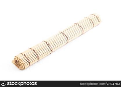 Roll a piece of wood on a white background. Wood is made into a coil.