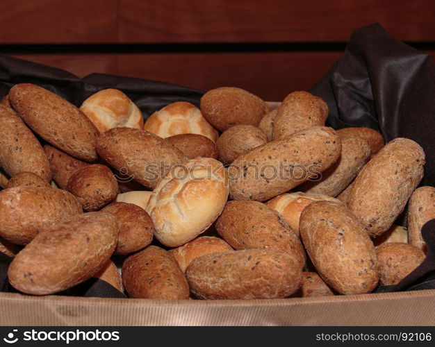 Roll Bread Heap and Wholemeal Rolls inside Box