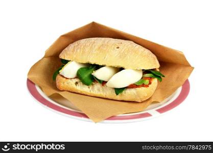 Roll filet americain filet sandwich on a white background.