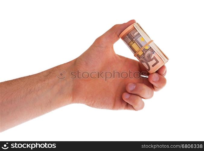 Roll of 50 euro bills in hand, isolated on white