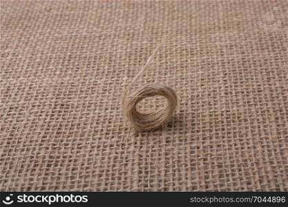 Roll of brown color linen string paper background