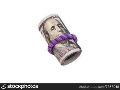 Roll of dollars with rubber band isolated on white background