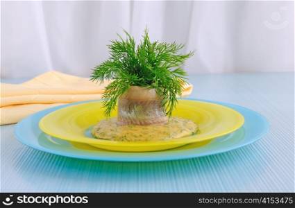 Roll of herring fillets in mustard sauce with herbs