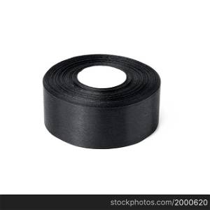 roll of silk black ribbon, wrapping decor, white isolated background