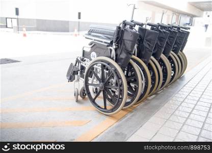 Roll of wheel chair with the hard sunlight. Healthcare concept