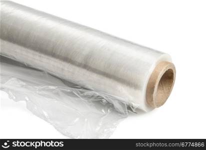 Roll of wrapping plastic stretch film. Close-up. Isolated on white background. With clipping path