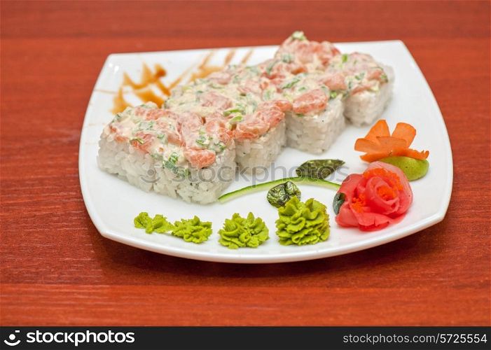 Roll with cream cheese sauce and salmon fish
