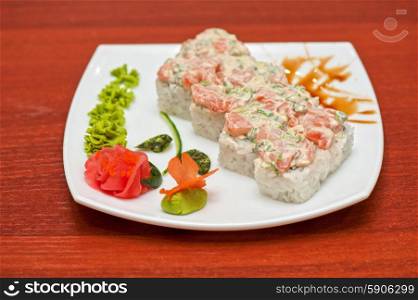 Roll with cream sauce and salmon fish