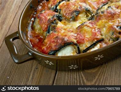 Rollatini di melanzane - Italian-style dish made with thin slices of eggplant,