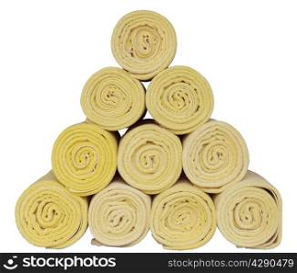Rolled up spa towels on white