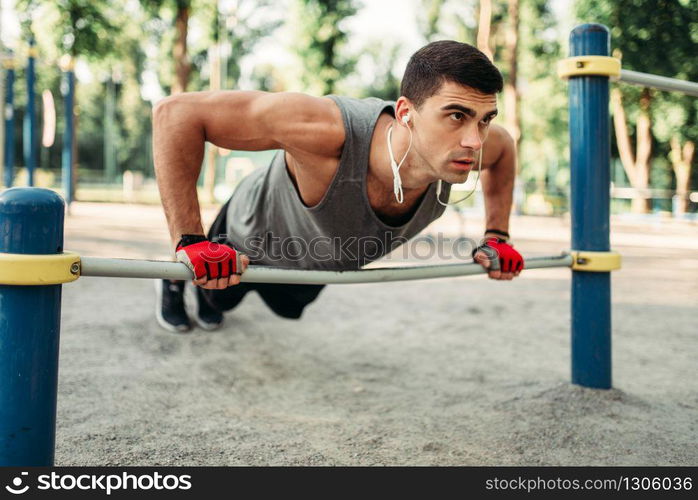 Roller skating, male skater carries skates on his shoulder, back view. Urban roller-skating, active extreme sport outdoors, youth leisure, rollerskating. Roller skating, skater carries skates on shoulder