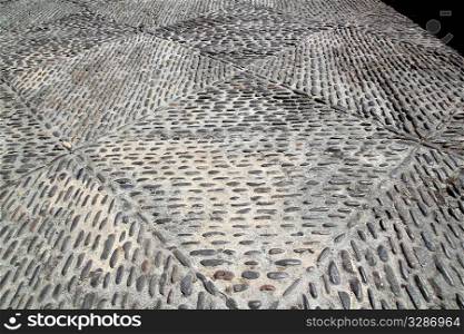 rolling stones mosaic medieval soil floor in Spain Aragon