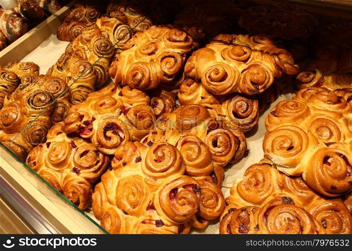 rolls figured on the counter. appetizing rolls on the counter of supermarket