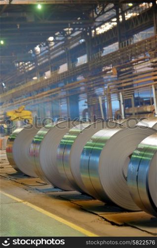 rolls of steel sheet in a warehouse