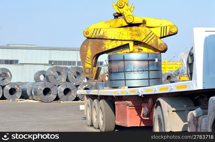 rolls of steel sheet in harbor