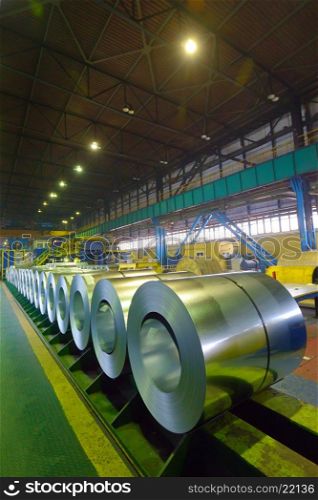 rolls of steel sheet inside of steel plant