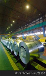 rolls of steel sheet inside of steel plant