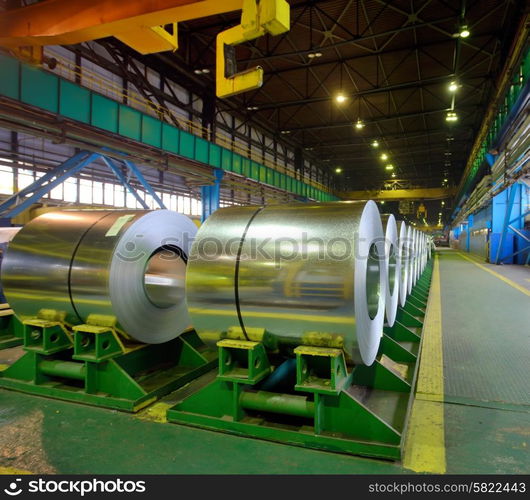 rolls of steel sheet stored in warehouse