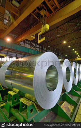 rolls of steel sheet stored in warehouse