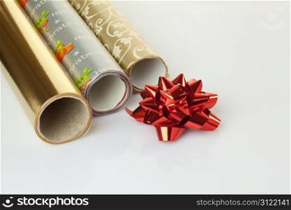 Rolls of wrapping paper with a decorative pompom
