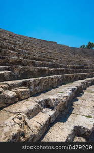 Roman amphitheatre in the ruins of Hierapolis. Roman amphitheatre in the ruins of Hierapolis, in Pamukkale, near modern turkey city Denizli, Turkey.