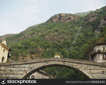 Roman bridge in Pont Saint Martin. Ancient roman bridge over torrent Lys in Pont Saint Martin, Italy