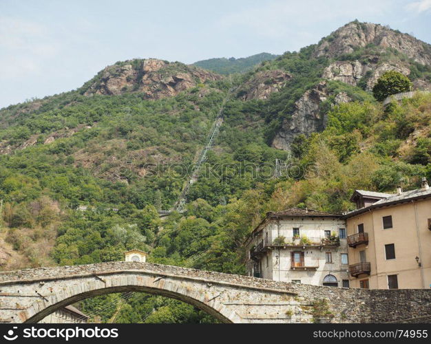 Roman bridge in Pont Saint Martin. Ancient roman bridge over torrent Lys in Pont Saint Martin, Italy