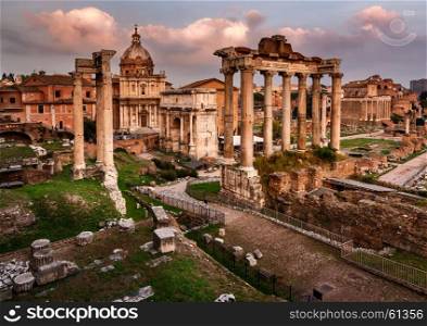 Roman Forum (Foro Romano) and Ruins of Septimius Severus Arch and Saturn Temple at Sunset, Rome, Italy