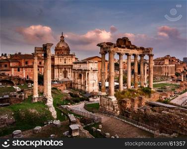 Roman Forum (Foro Romano) and Ruins of Septimius Severus Arch and Saturn Temple at Sunset, Rome, Italy
