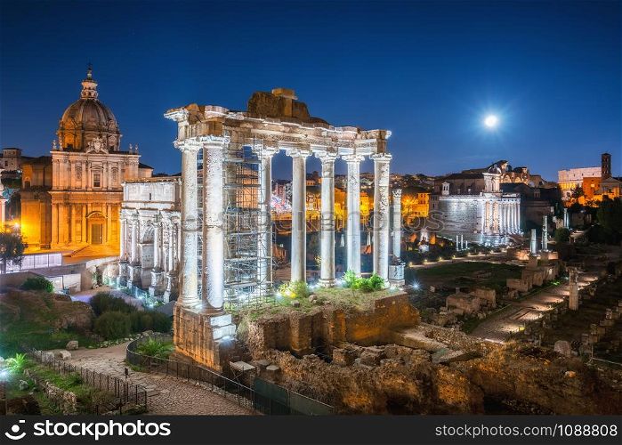 Roman Forum in Rome , Italy . Roman Forum was build in time of Ancient Rome as the site of triumphal processions and elections. It is famous tourist attraction of Rome , Italy .