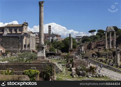Roman Forum in the city of Rome, Italy. Including: the Temple of Antoninus and Faustina, Temple of Venus and Rome, Column of Phocas, Arch of Titus, Temple of Vesta and the Temple of Castor and Pollux.. Roman Forum in the city of Rome - Italy