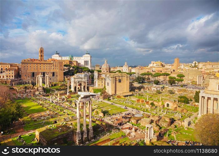 Roman forum ruins on a cloudy day in Rome, Italy