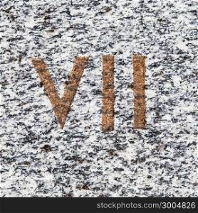 Roman numbers collection, from 1 to 7, on a real ancient granite