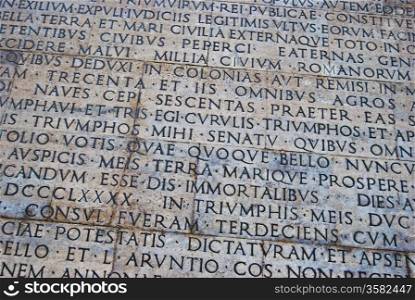 Roman scripture. writing on the outside wall of the peace altar in Rome