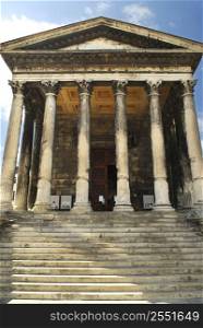 Roman temple Maison Carree in city of Nimes in southern France
