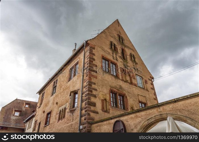 Romanesque house of the Rathsamhausens at street of Pelerins 8 by day, Obernai, Alsace, France. Romanesque house of the Rathsamhausens at street, Obernai, Alsace, France