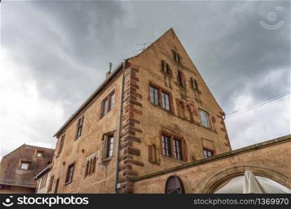 Romanesque house of the Rathsamhausens at street of Pelerins 8 by day, Obernai, Alsace, France. Romanesque house of the Rathsamhausens at street, Obernai, Alsace, France