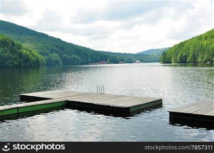 romania valiug village three waters gozna lake landscape pontoon