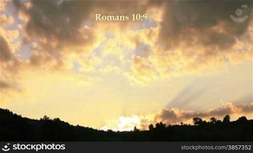 Romans 10:9 Bible verse written with light.