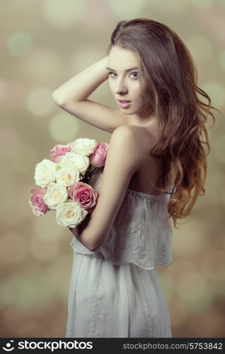 Romantic, beautiful, natural , sweet, young girl in white vintage dress, curly hairstyle and bouquet of roses.
