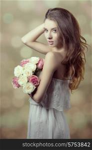 Romantic, beautiful, natural , sweet, young girl in white vintage dress, curly hairstyle and bouquet of roses.