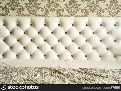 Romantic bedroom interior design. Closeup a big sofa in the luxury interior
