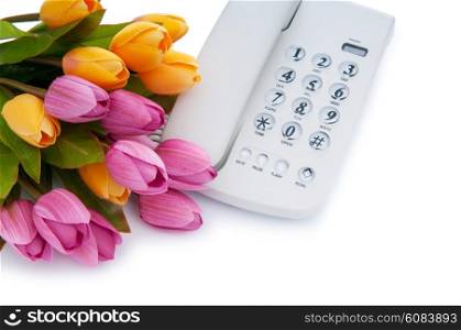 Romantic concept with phone and tulip flowers
