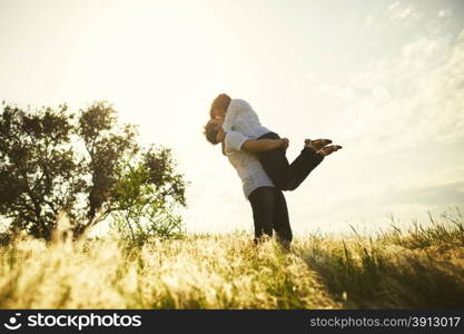 Romantic couple kissing, summer outdoor