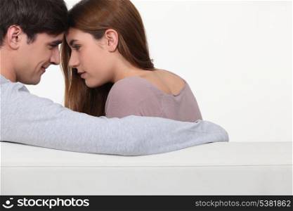 Romantic couple on sofa