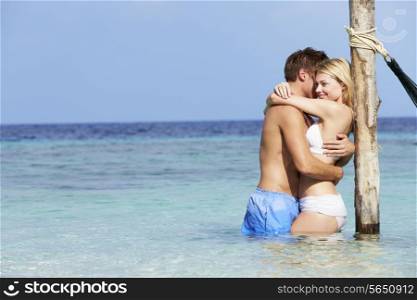 Romantic Couple Standing In Beautiful Tropical Sea